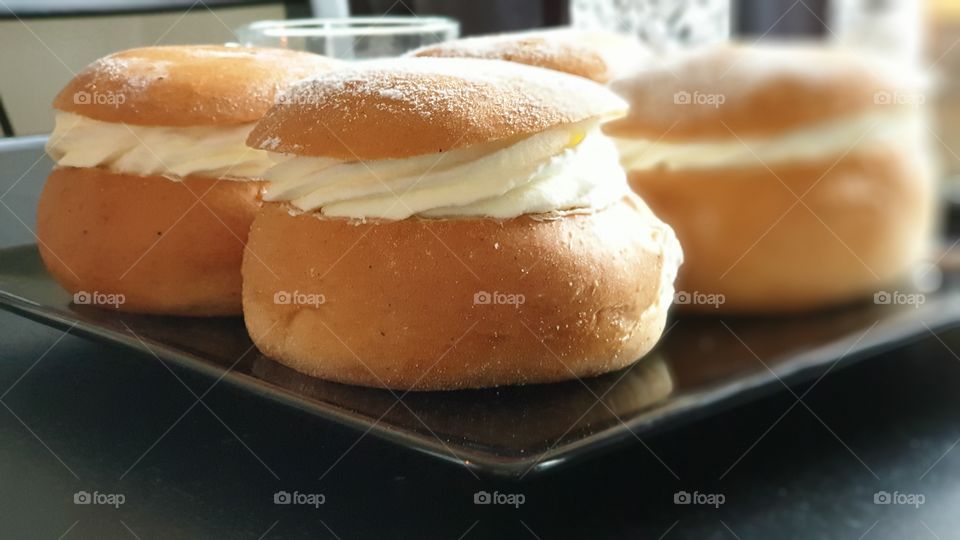 Semla, bun with whipped cream and filled with almond paste , typical Swedish food 