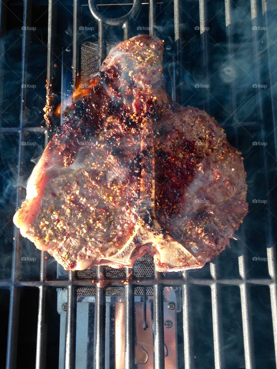 T-bone steak. Grilling