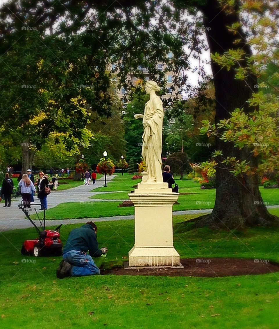 Park gardener. Keep good care of the park gardens - people gardening mission