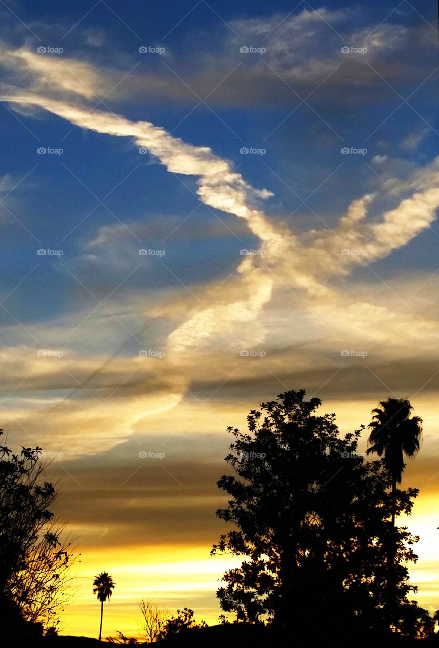 painted by airplanes. a beautiful sky viewed from my front yard