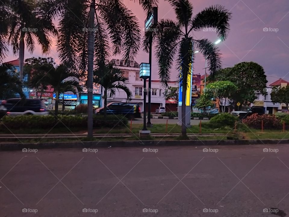 view of highway and shop. as well as motorbikes