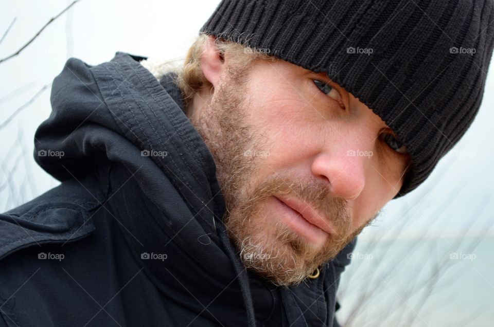 Man with Black hat and coat