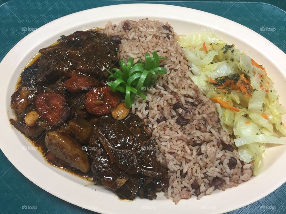 Brown Stewed Oxtail with Steamed Cabbage and Red beans and Rice
