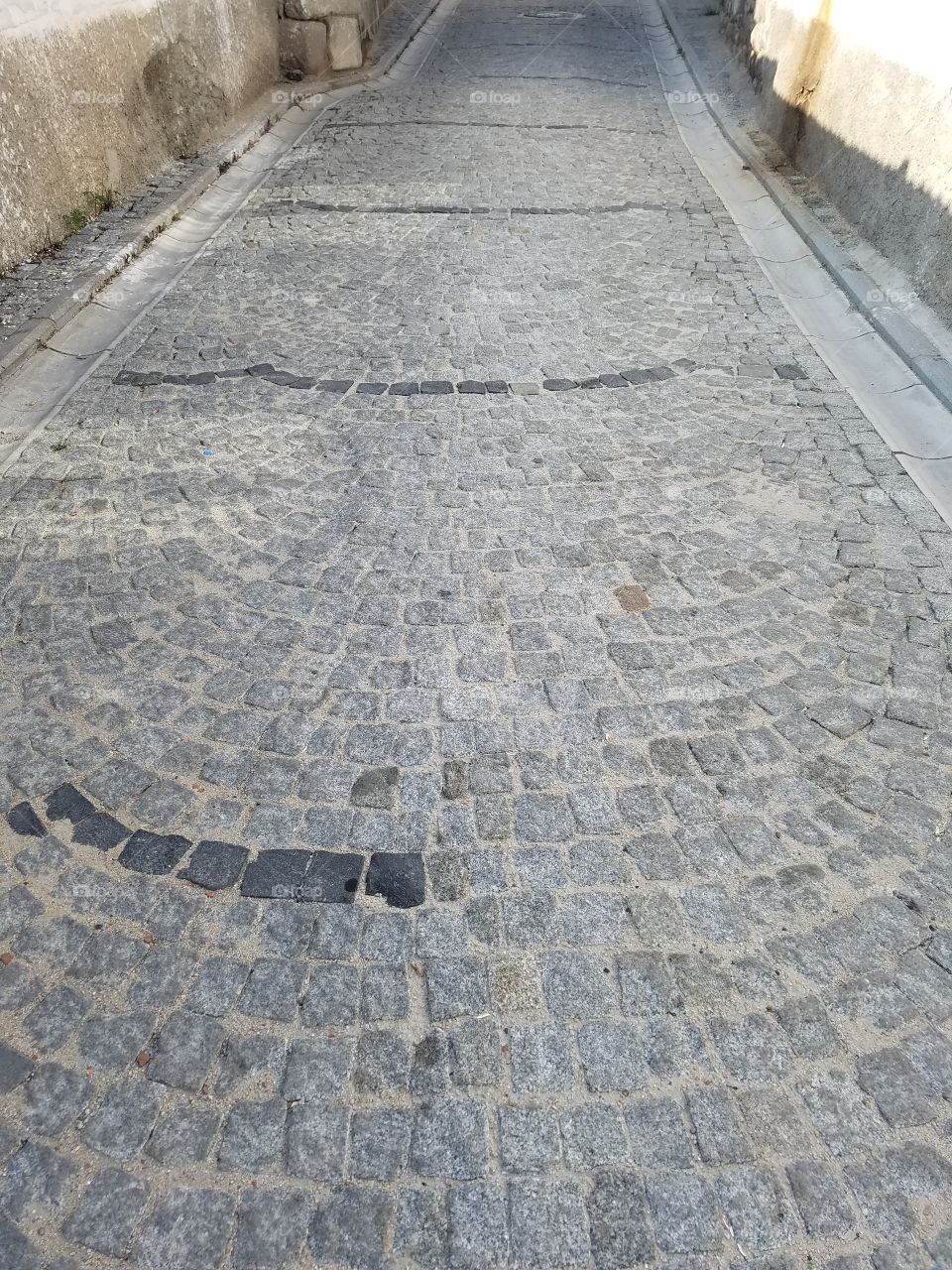 a design in the streets inside of the ankara castle in Turkey overlooking the city