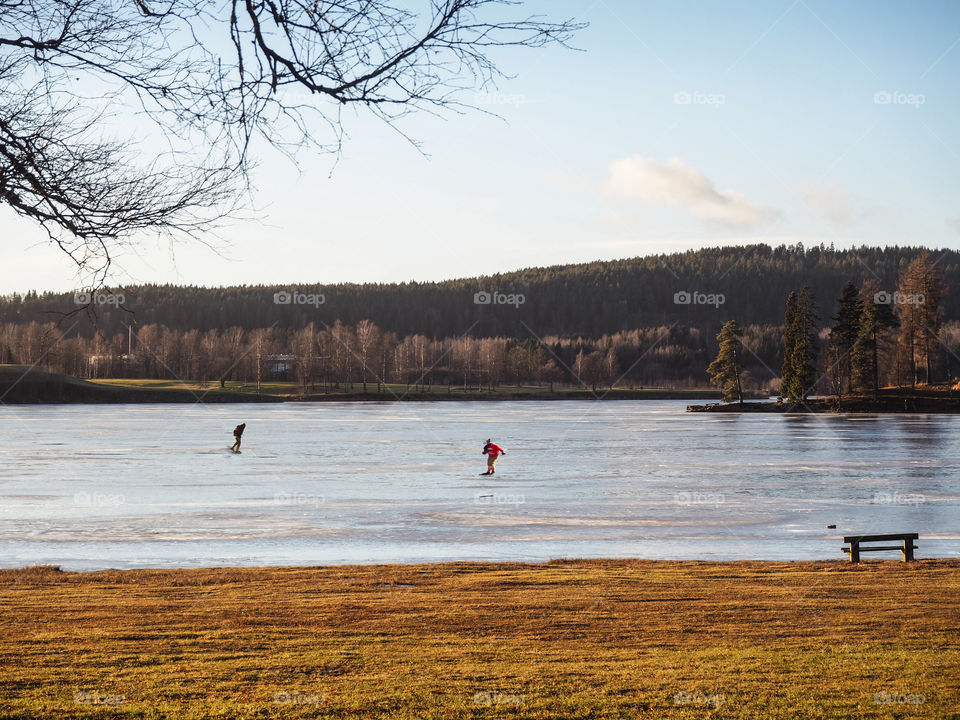 Skating on a lake. 