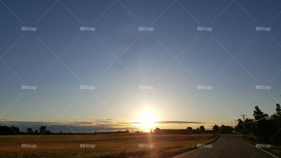 Scenic view of road during sunrise