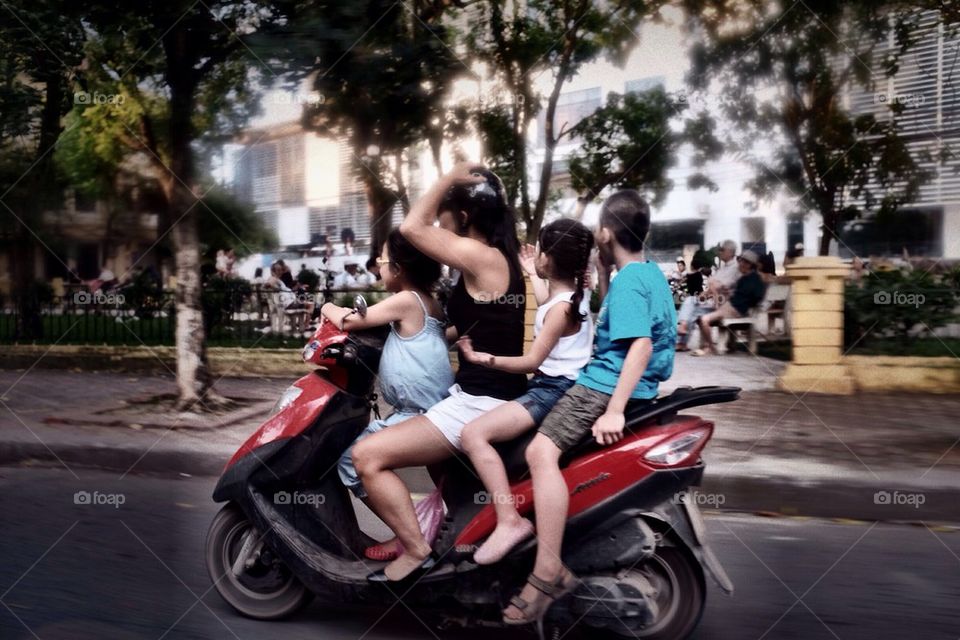 Family on a scooter