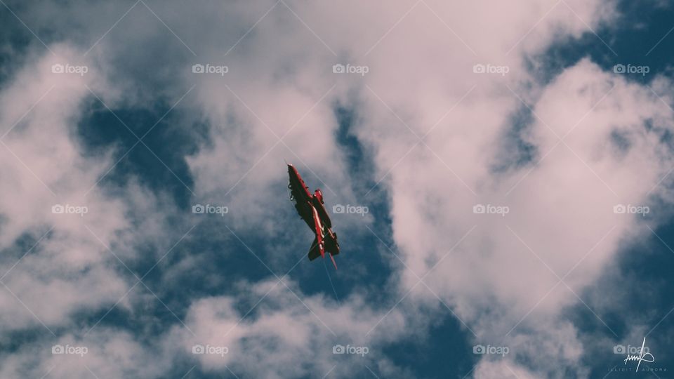 B.A.E hawk (red arrow variant) flying high in the sky