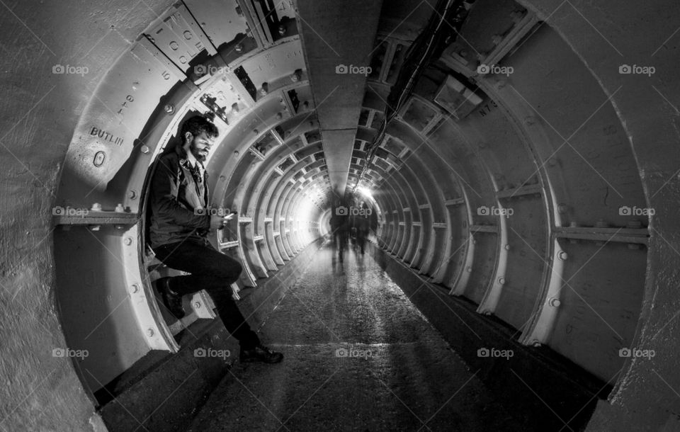 Passing time in a lapsed tube. Waiting in black and white 