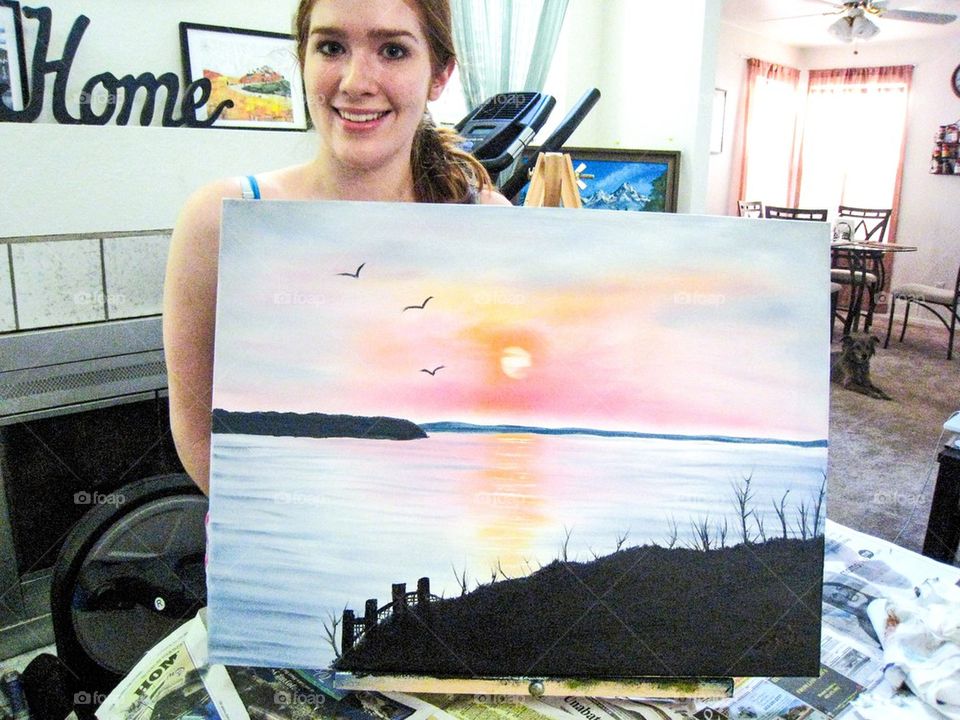 Artist and her painting