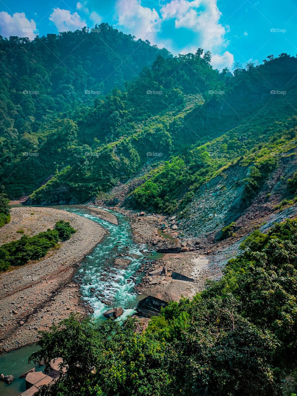 a beautiful destination with water ,trees and mountains.