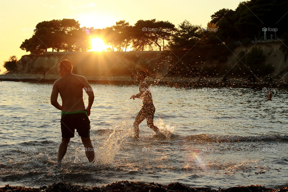 Playing in sunset