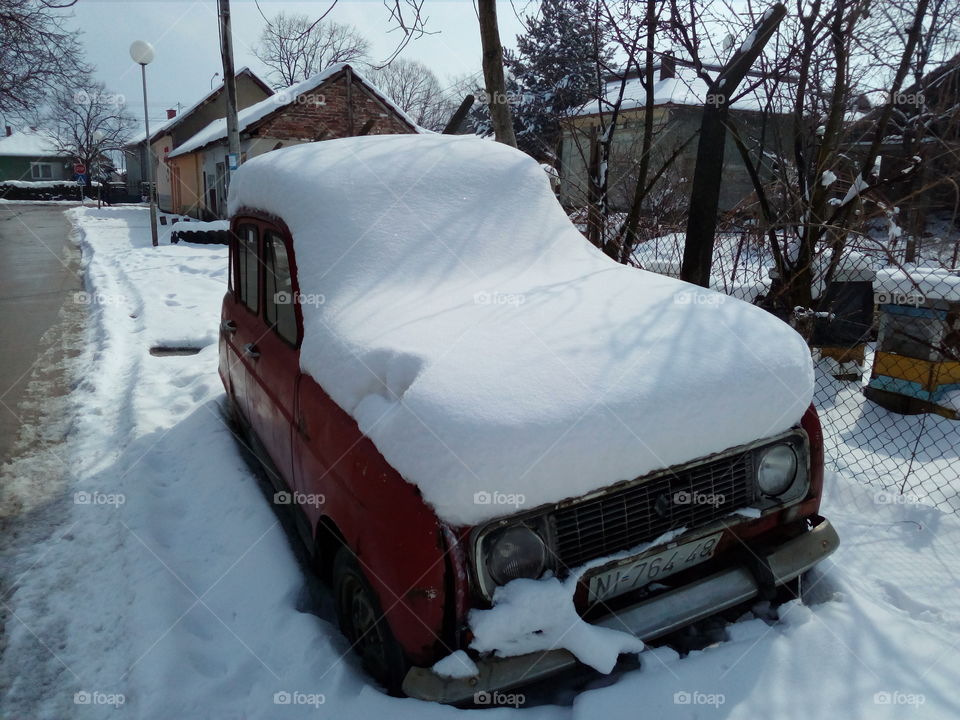 Renault 4 with snow