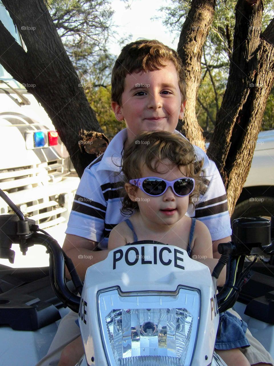 Kids on a police bike