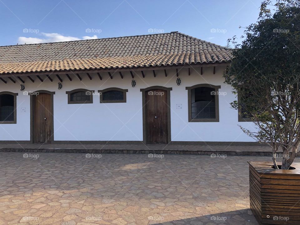 Farm house with wooden frames for doors and windows