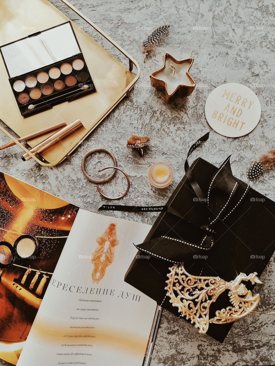 Winter mood flat lay with present and woman stuff