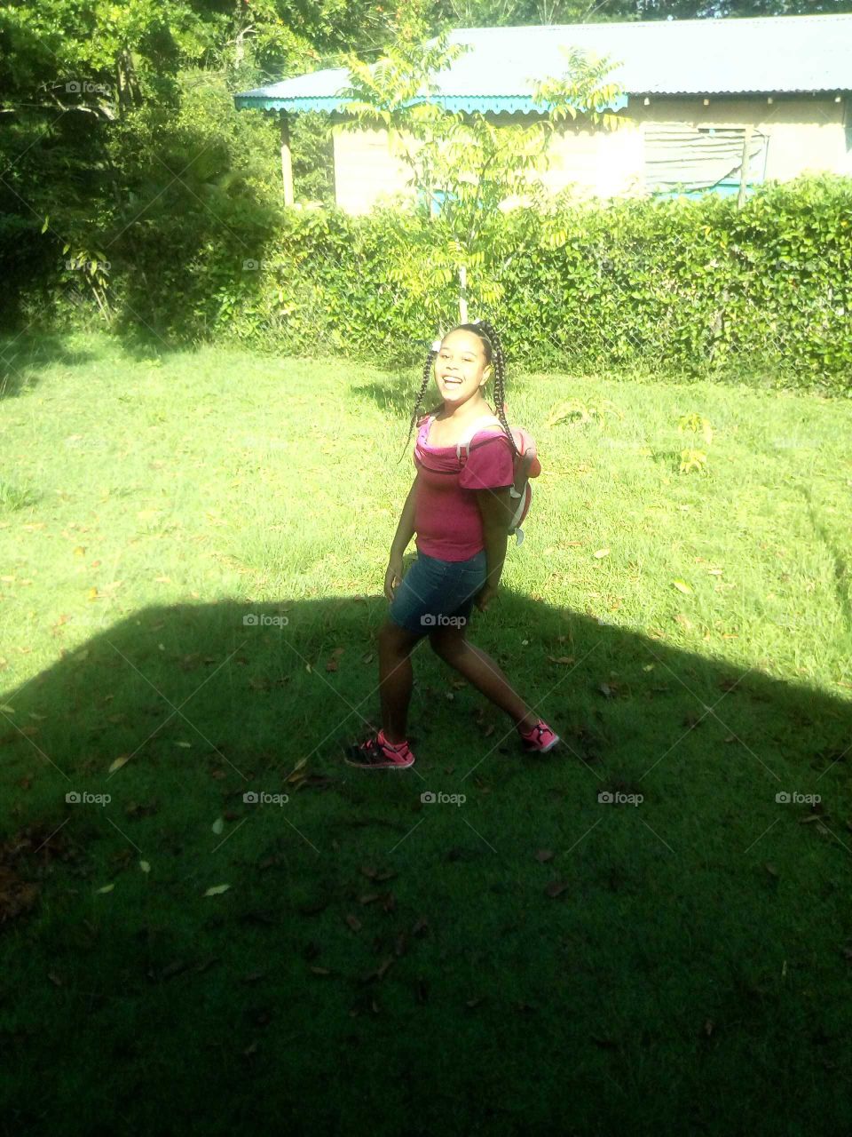 this beautiful girl has the best smile on her face she makes you think happy an keep smiling.