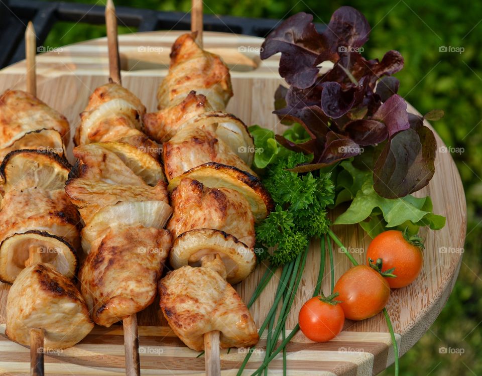 Meat and vegetables on cutting board