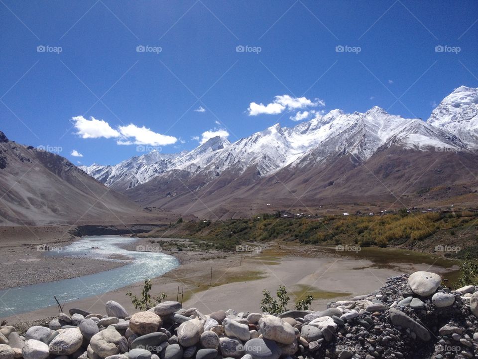 Indus river starts in Himalayan mountains as small, fast and cold spring and grows into the river. It's never-forget color seems idyllic 