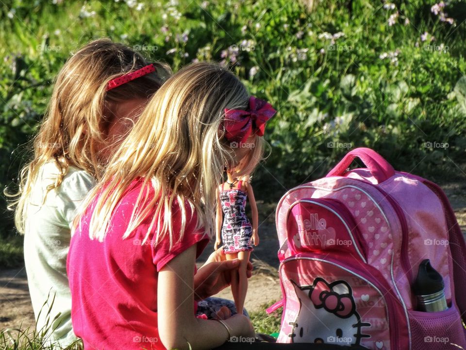 Young Girls Playing With Dolls

