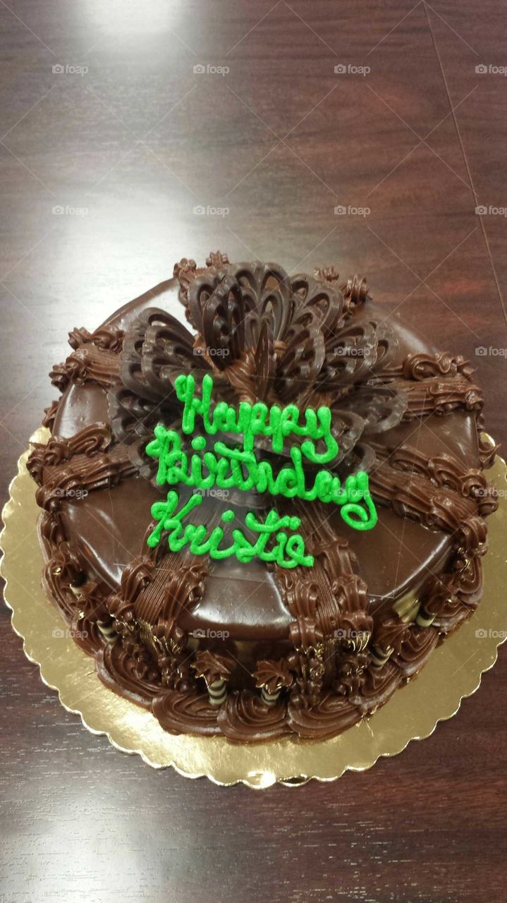 Chocolate Birthday Cake with Greeting in Green Icing