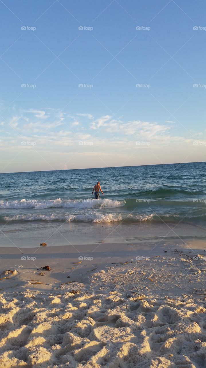 playing in the waves