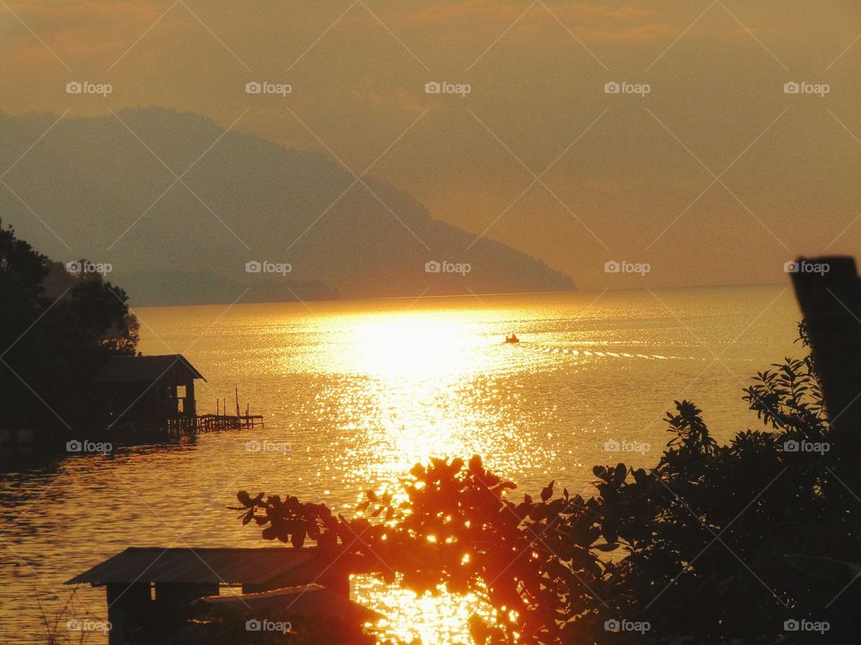 Sunday sunset on matano lake