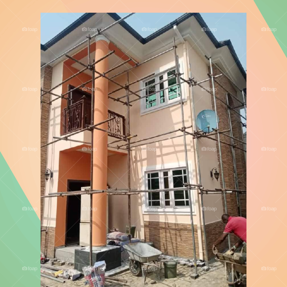 A well painted duplex building