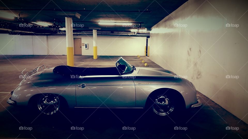 Soft top Shiny car. Shiny silver car with soft top down