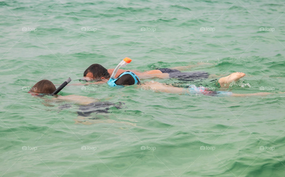 Snorkeling together as a family