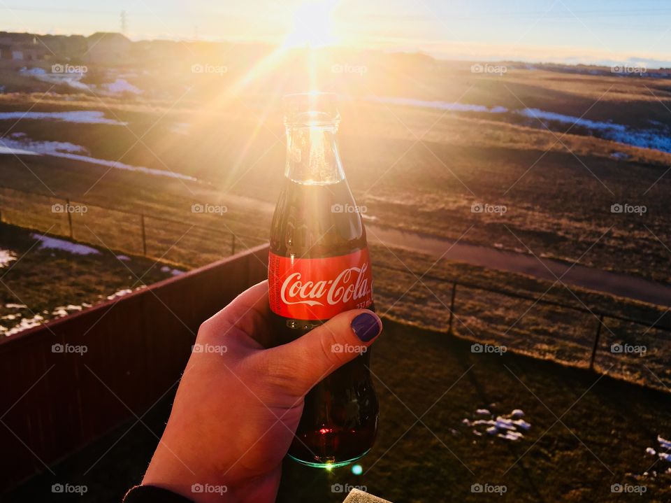 I go out on my deck and enjoy a cold Coca Cola and watch the sunset!