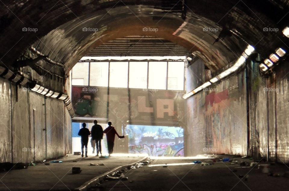 Boys in tunnel