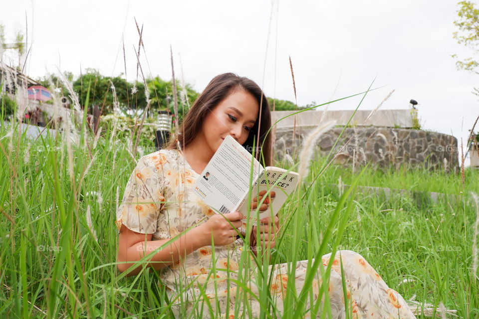 Reading in the grass