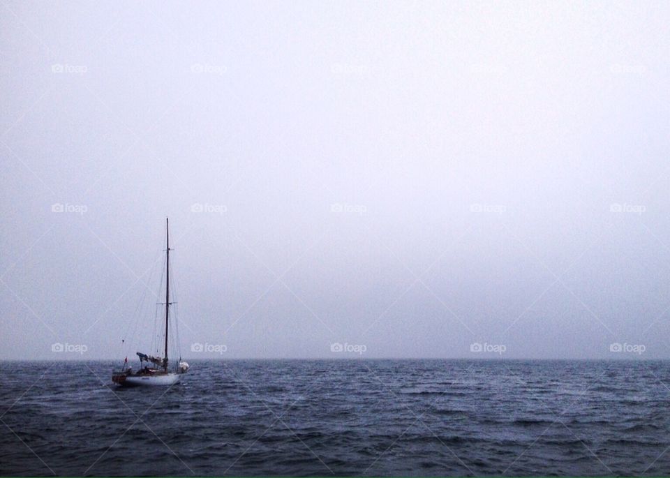 sailboat in the fog
