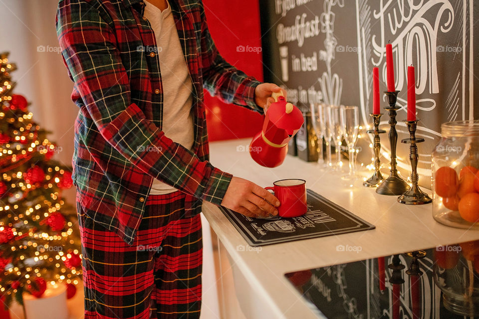 cup of coffee in a cozy festive Christmas atmosphere