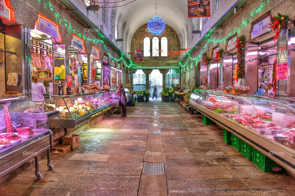 Plaza de Abastos. Plaza de Abastos ( street market ) in Santiago de Compostela is the second most popular tourist attraction in the city.