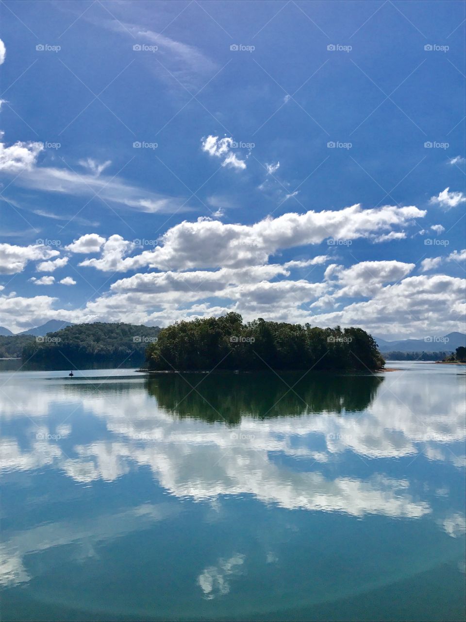 Sky, clouds and a peaceful lake