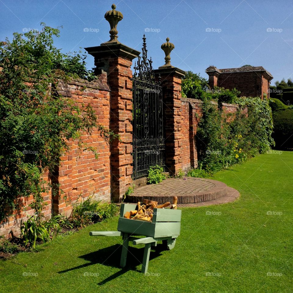 	Formal gardens of Packwood House stately home - Warwickshire, England UK.