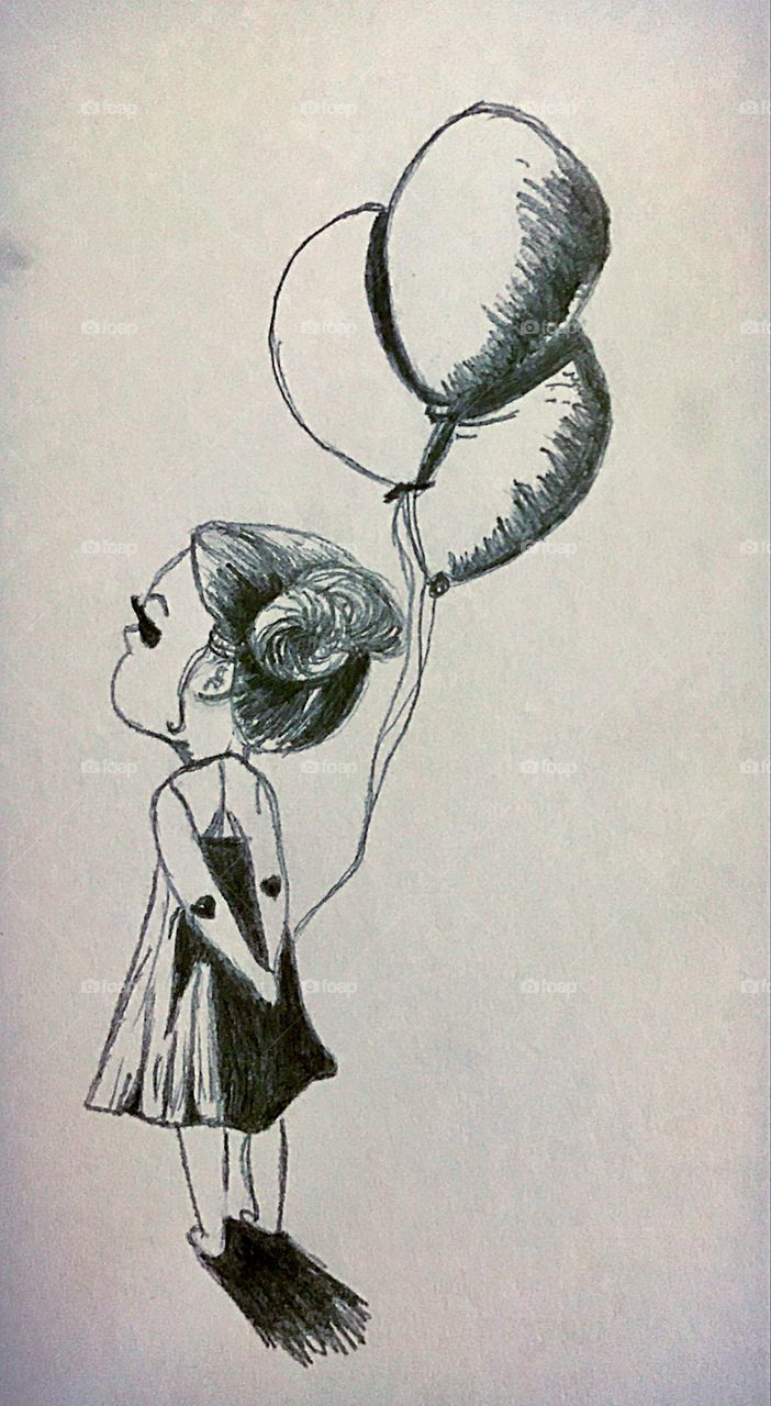 Little girl with balloons drawing 