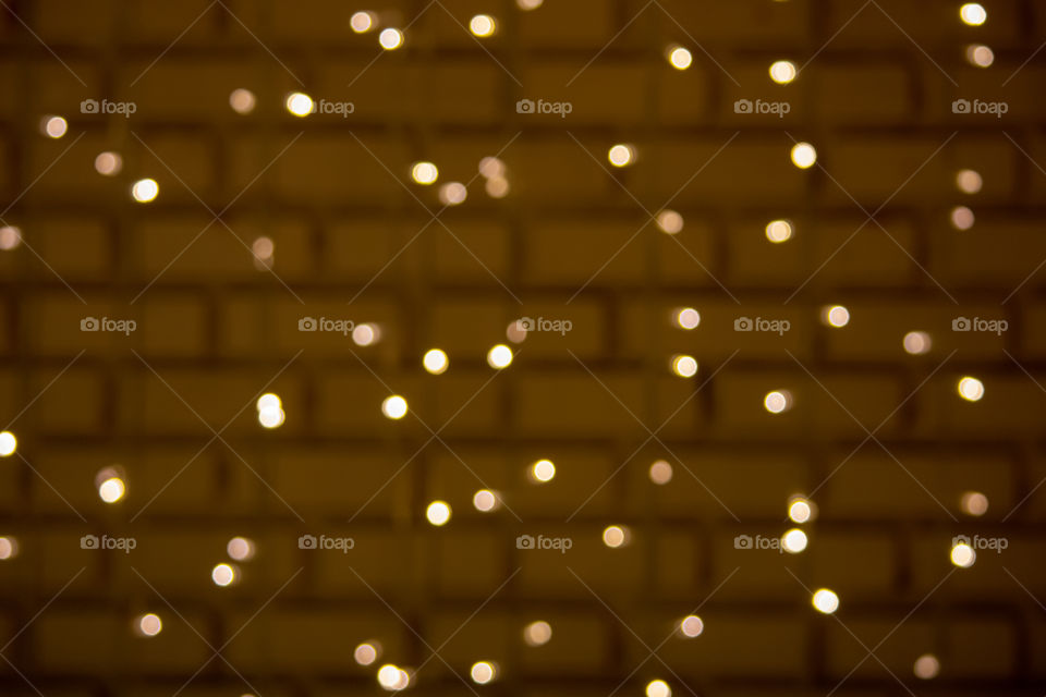 The blur of the bulb for decorative yellow gold, as the background.