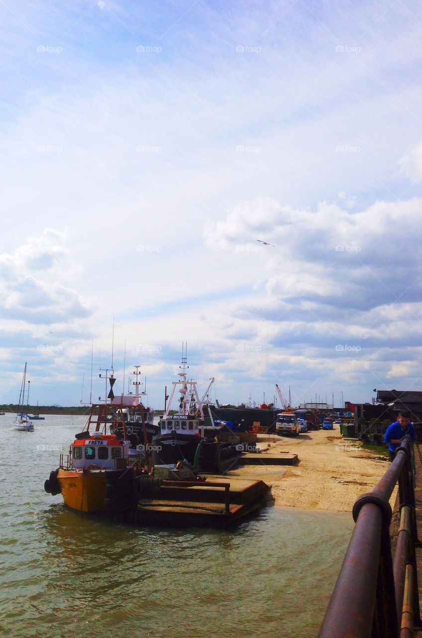 Fishing boats moored at Leigh On Sea, Essex, England.