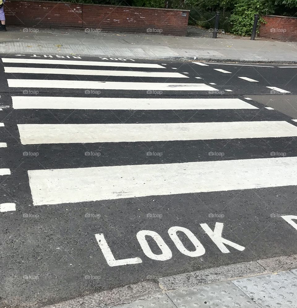 Abbey road zebra crossing it’s self the same crossing the Beatles walked on