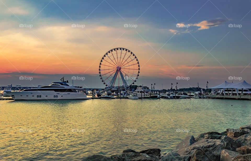 Sunset pier with Ferris wheel 