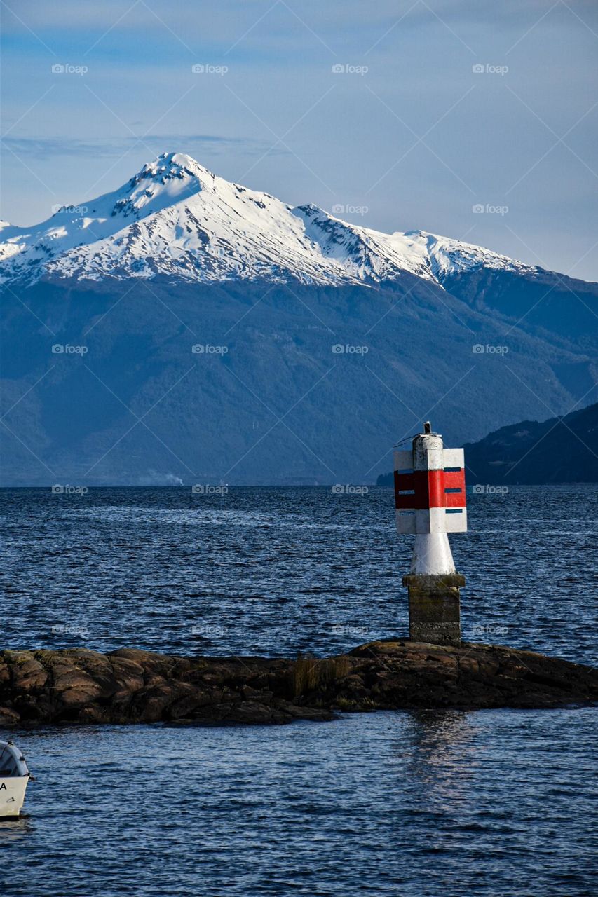 Amazing view of a volcano in the other dude of the sea in Patagonia Chile 