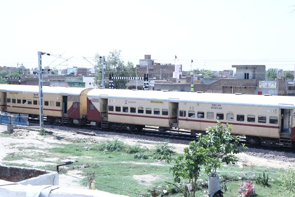 train running on track in front of my house