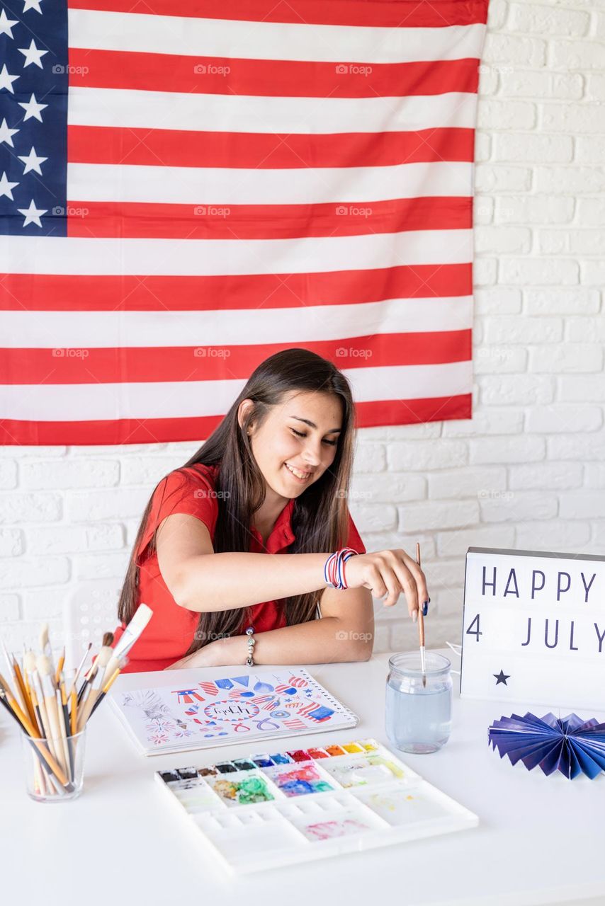 woman holding USA flag