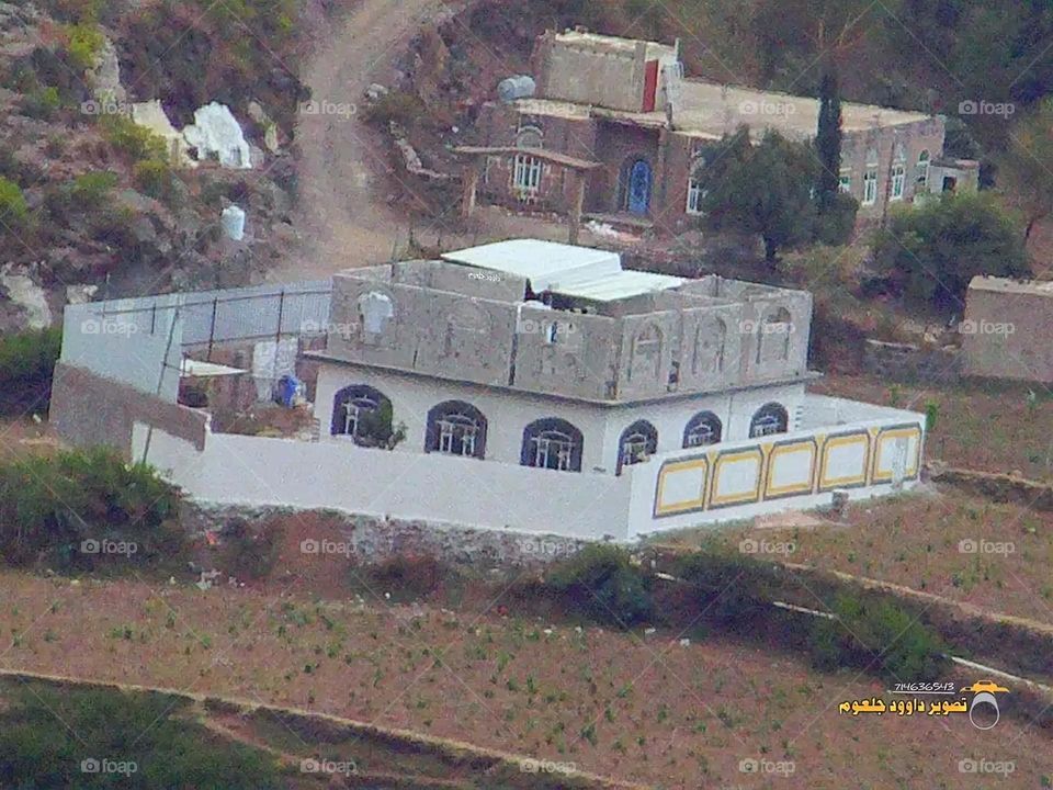 A stunning view of green mountains covered in fog in Yemen