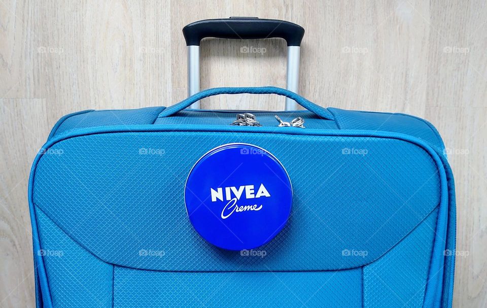 On a trip with me always Nivea cream💙🤍 Suitcase🧳Travel🛄 Body care 🤍💙