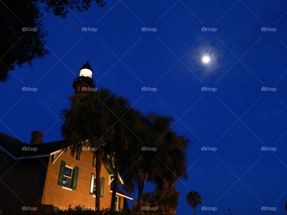 The lighthouse at night. Ponce Inlet lighthouse in the moonlight 