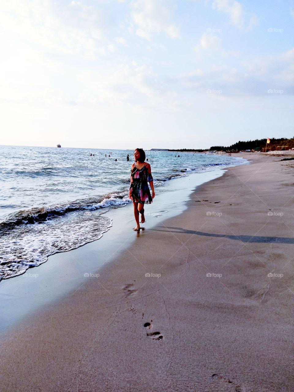 walking at the seashore, watching the waves and feeling the breeze from the ocean